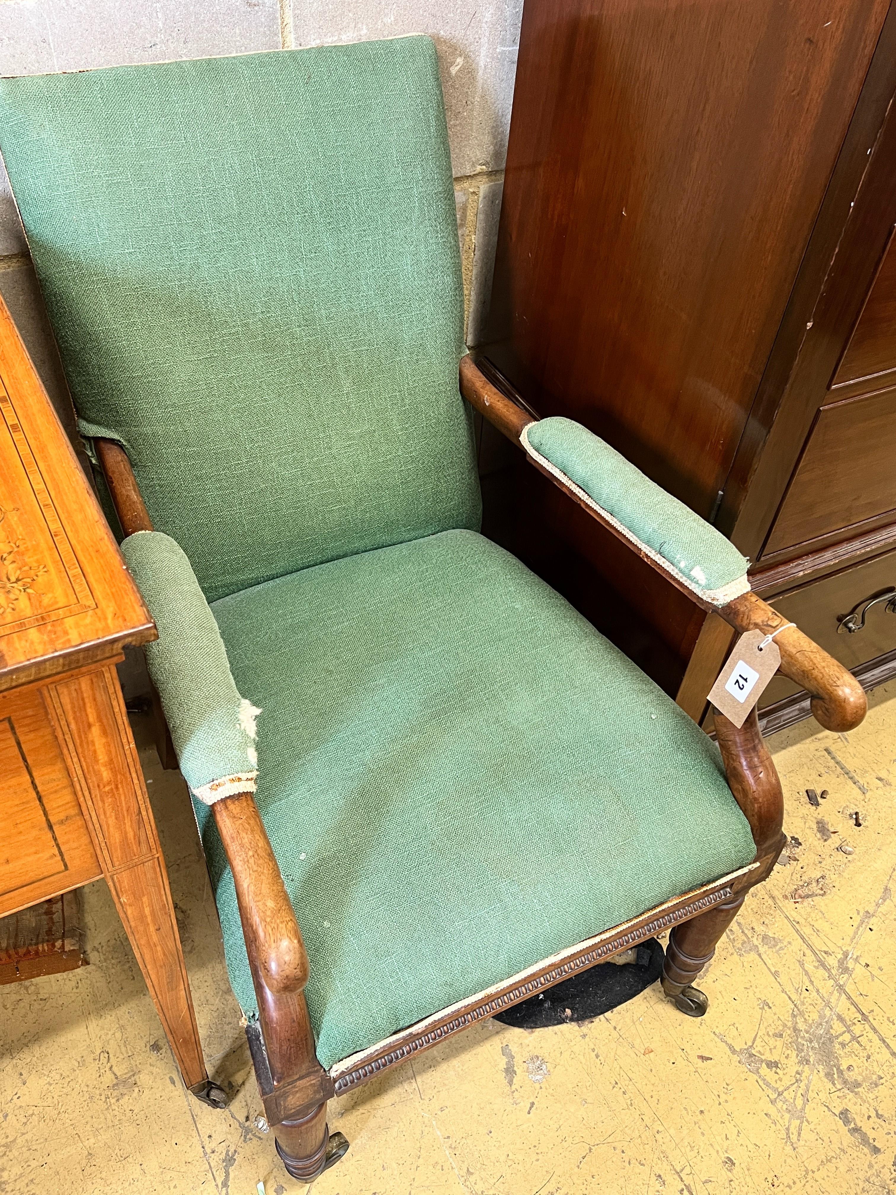 An early Victorian mahogany framed upholstered open armchair, width 52cm, depth 70cm, height 84cm